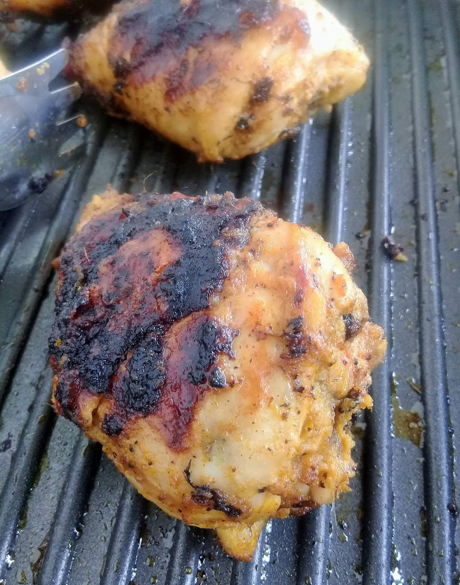 Togolese style grilled chicken biscuits and ladles